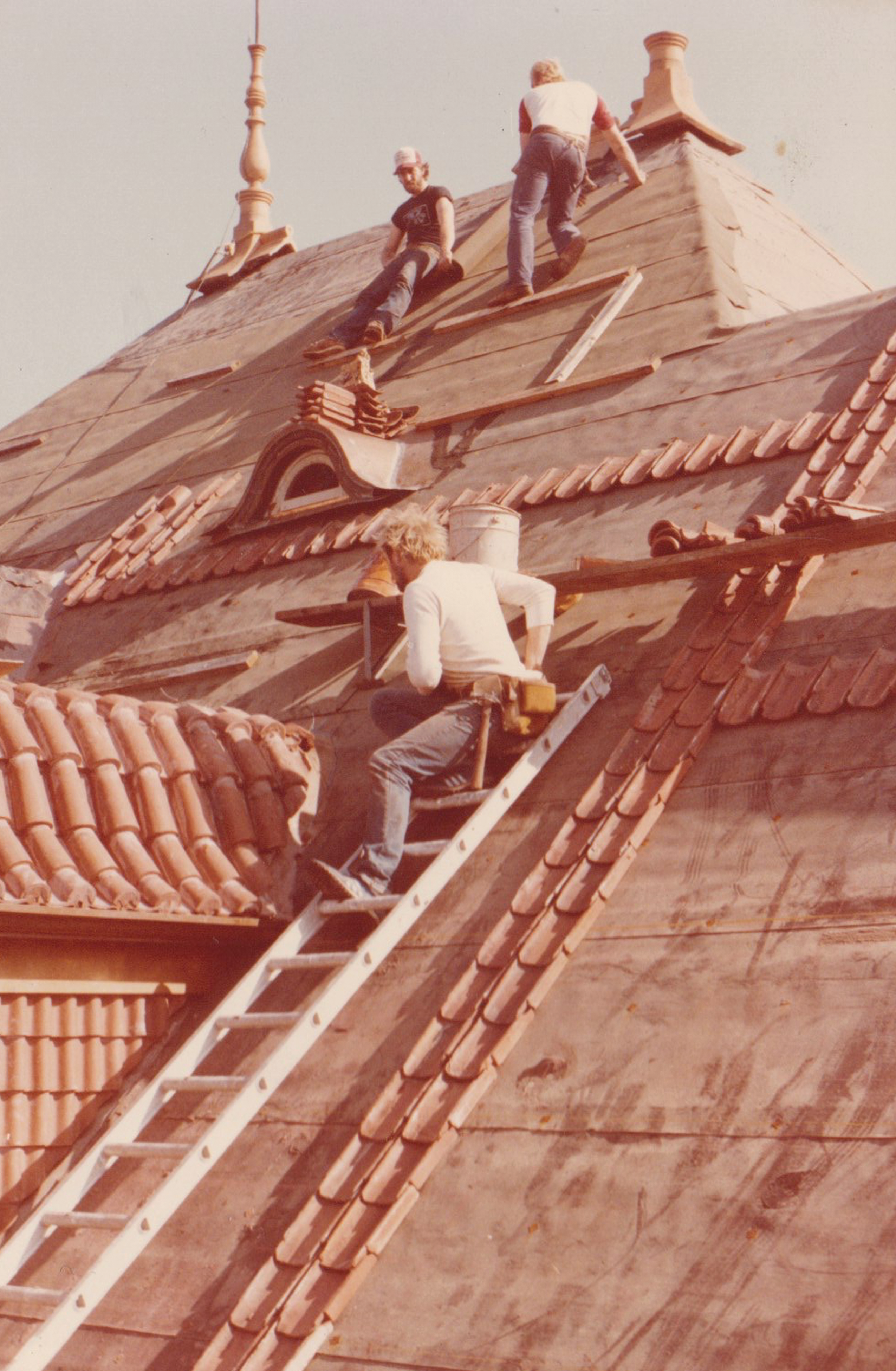 Full crew on a tile roof, early 1980s