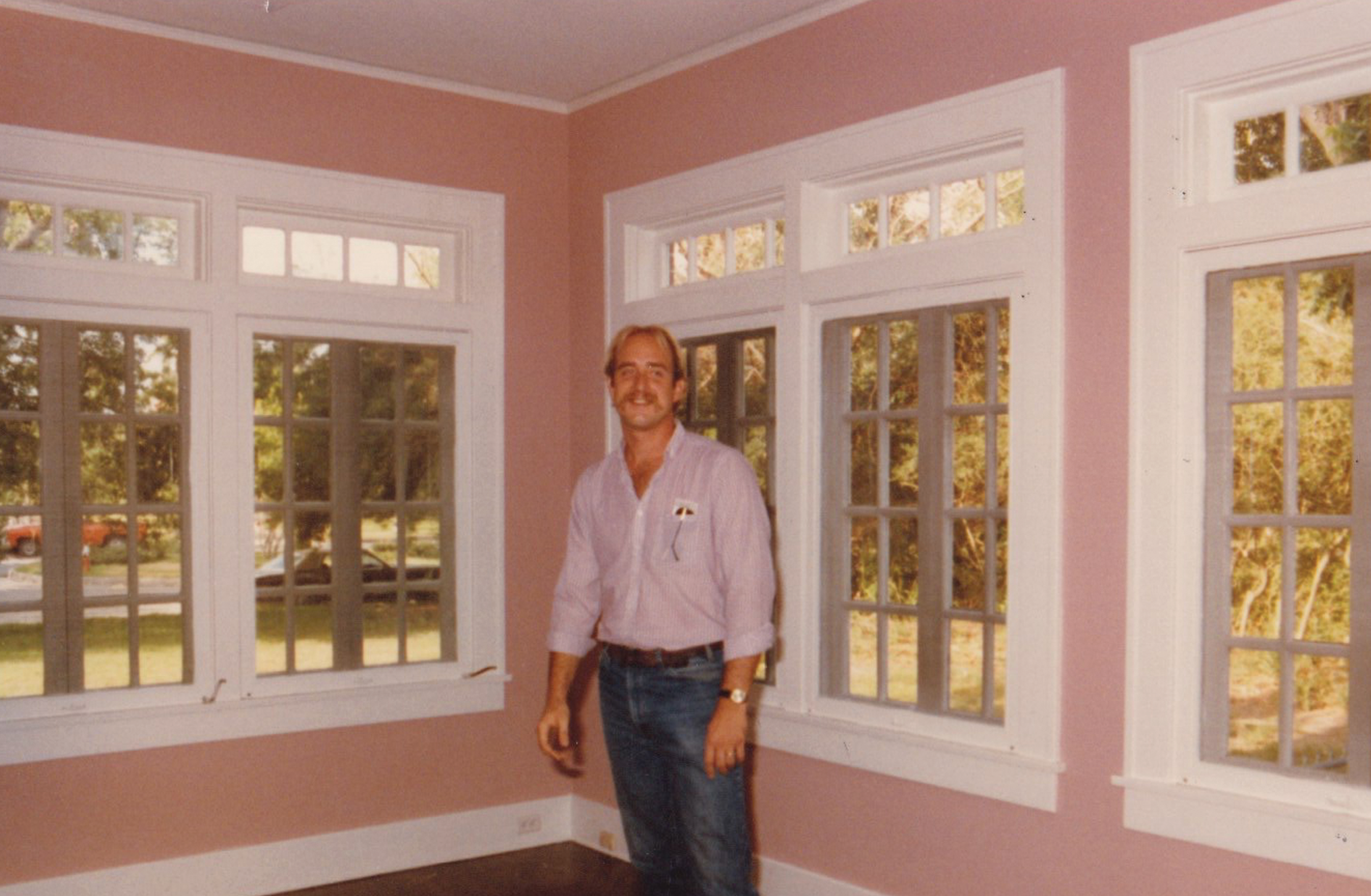 Inspecting newly framed windows in a restoration