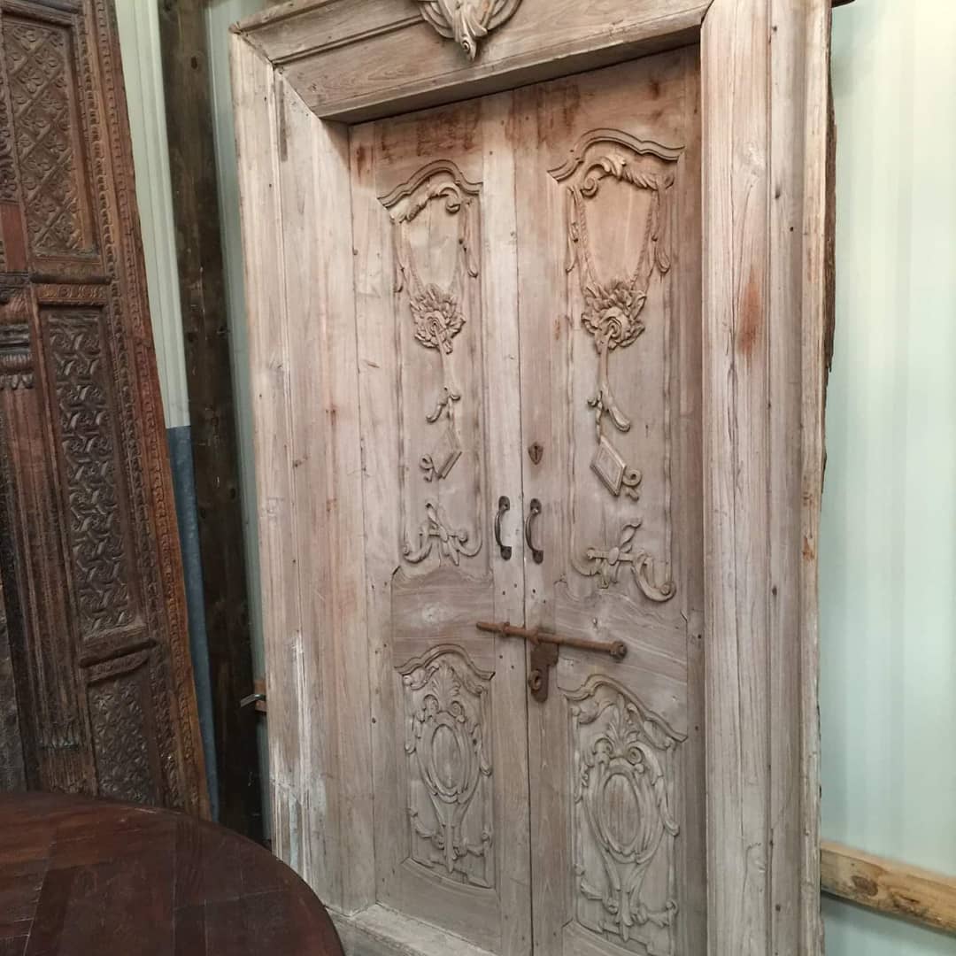 Antique armoire with ornate carved details