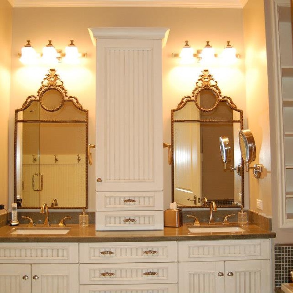 Luxury bathroom vanity with dual gold mirrors