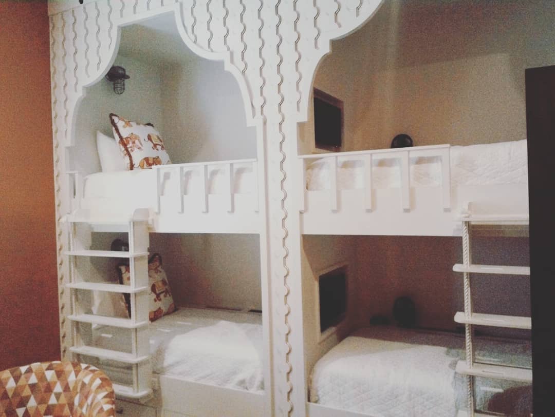 Custom bunk room with ornate white details