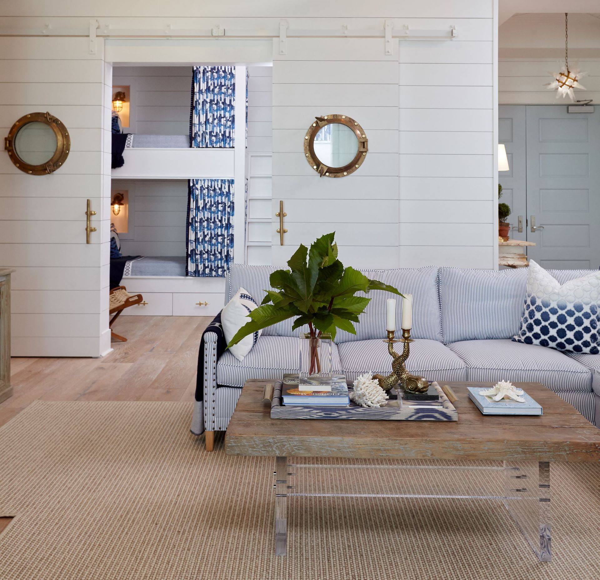 Coastal room with shiplap walls and bunk beds