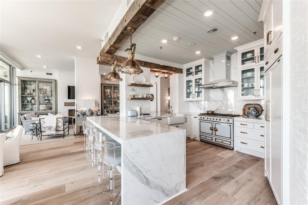Luxury kitchen with marble waterfall island