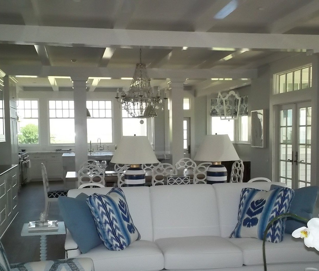 Coastal open kitchen with coffered ceiling