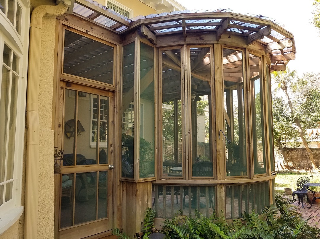 Custom curved sunroom addition on historic home