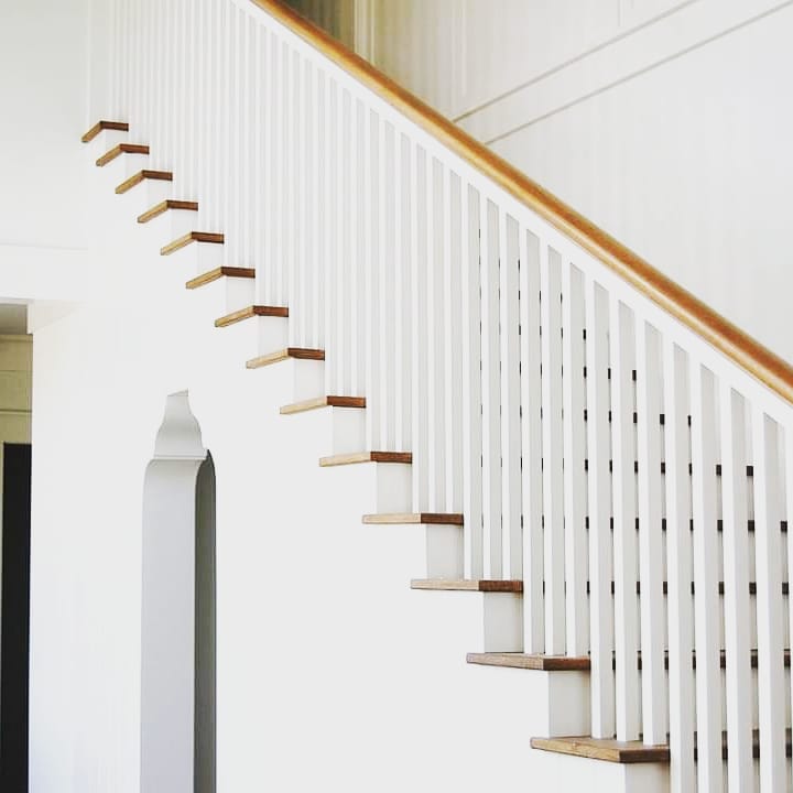 Modern floating staircase with wood treads